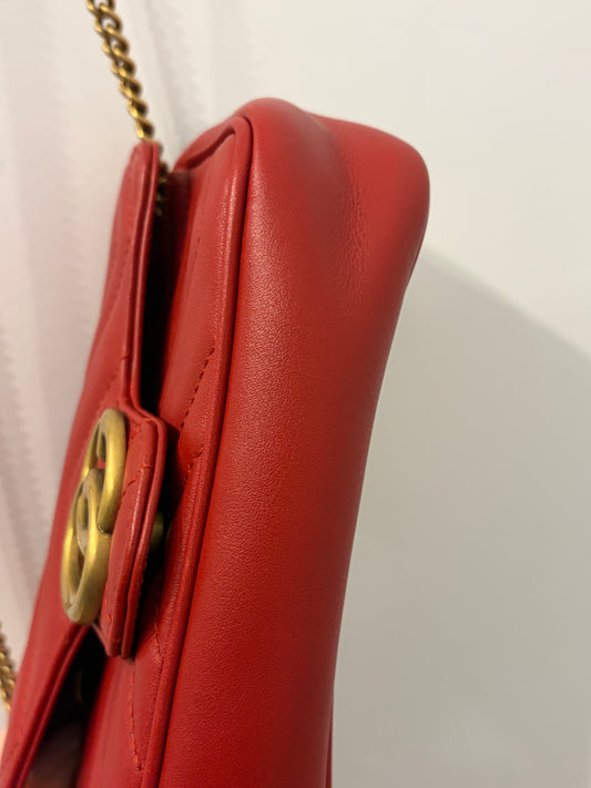 Gucci GG Marmont Super Mini Chain Shoulder Bag in Hibiscus Red Matelassé Leather with antique gold hardware